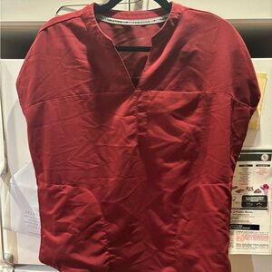 Fabletics women’s scrub top in deep burgundy